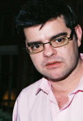 Alex Barnett listening intently